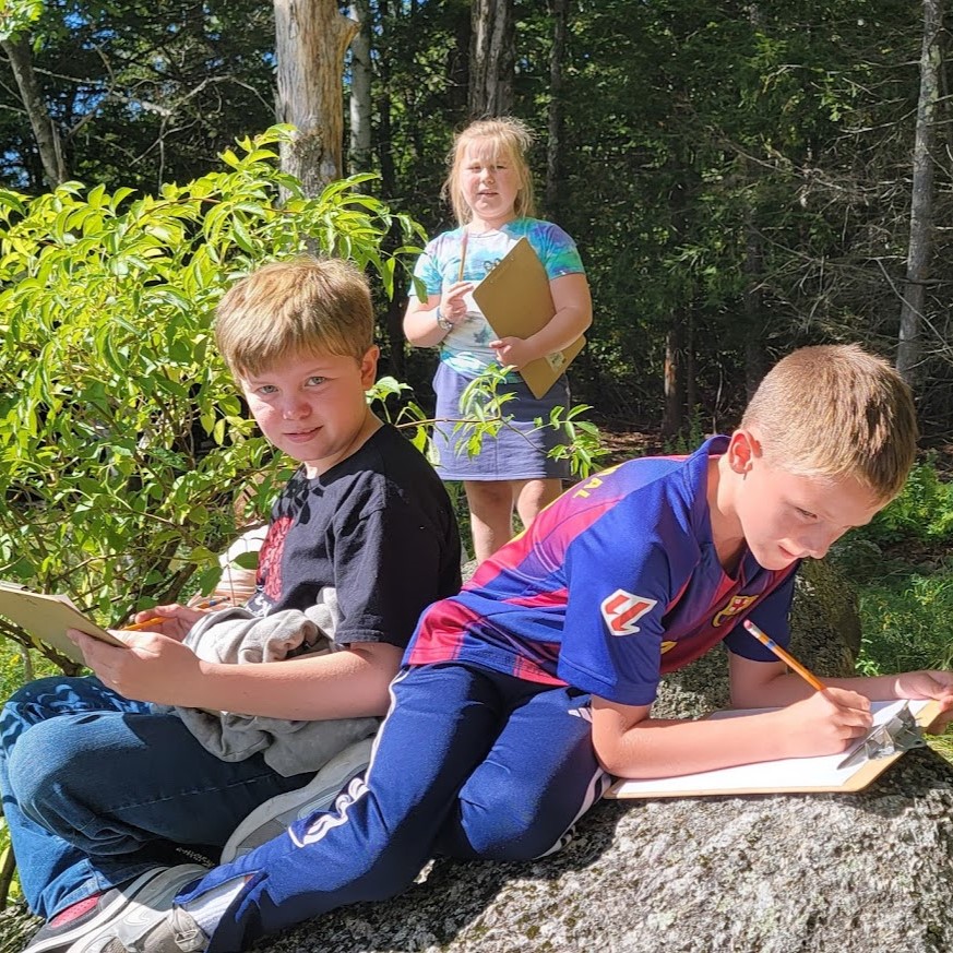 students doing work outside